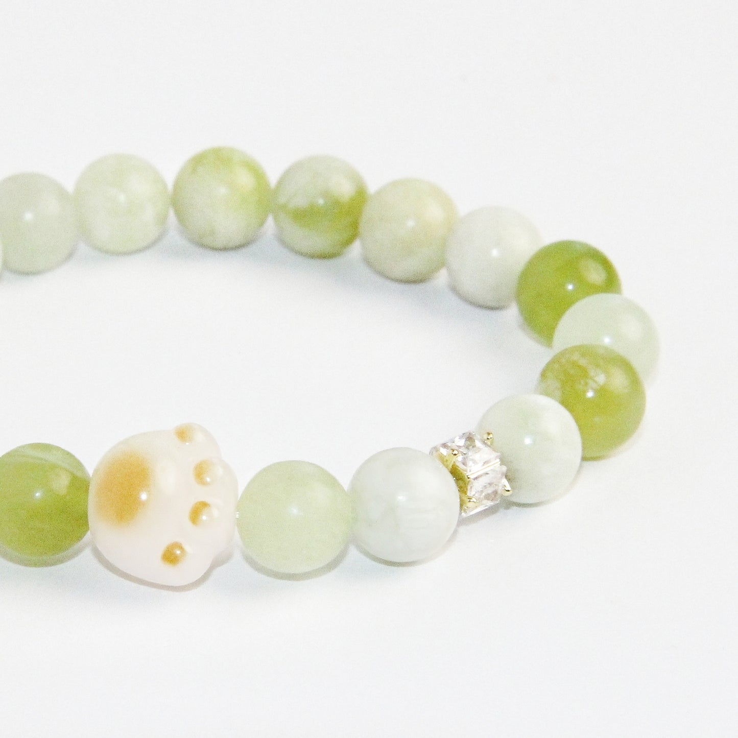 Jade Bracelet with Cat Claw Bead
