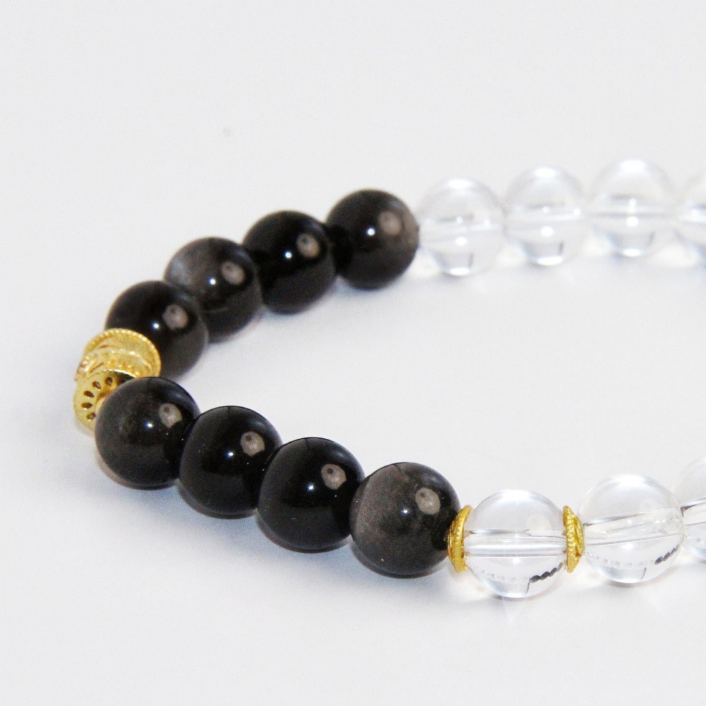 White Crystal Bracelet With Black Obsidian And Gold Beads