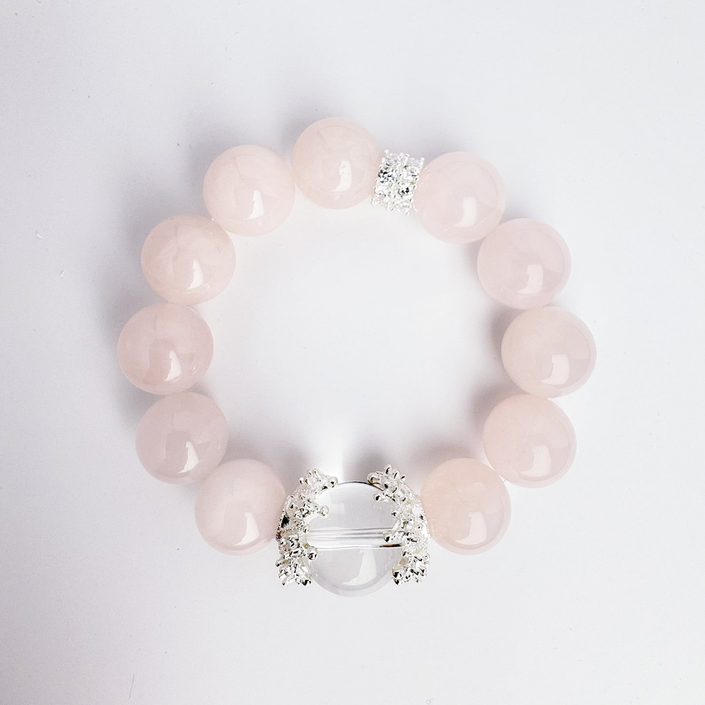 Roze Quartz Bracelet with Clear Quartz Bead